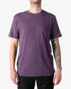 Flat lay of the Unity Purple Nakoa Tee from So iLL x On The Roam